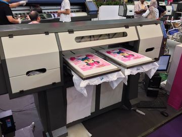 Porcellana diriga verso la stampante TX202 dell'indumento per stampa della maglietta con le teste di Epson DX5 fornitore